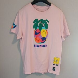 Nike Pastel Pink Tee with Vibrant Graphic